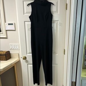 MARINA Black Sleeveless Jumpsuit with High Neckline